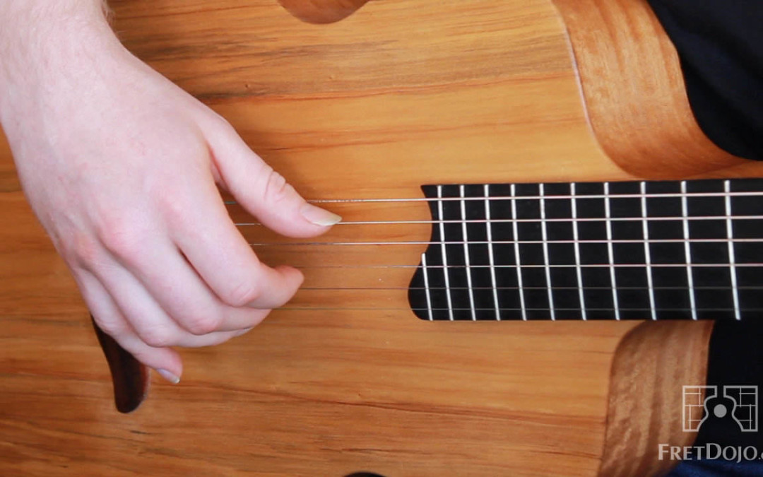How to Play the Travis Fingerpicking Pattern