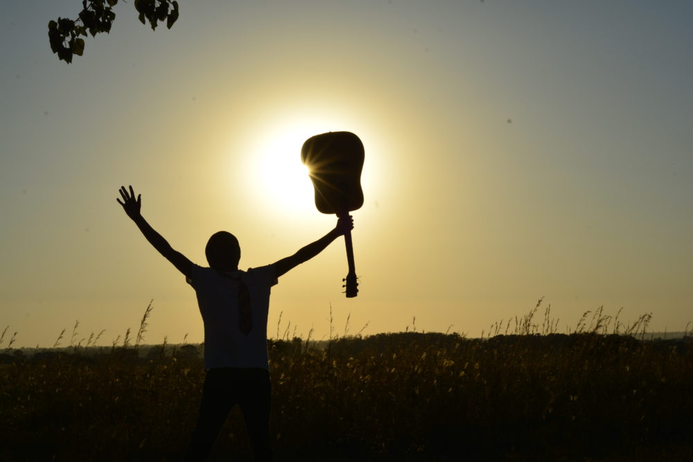 Man holding guitar
